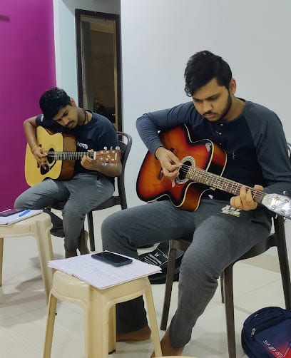 Acustico Guitar Institute